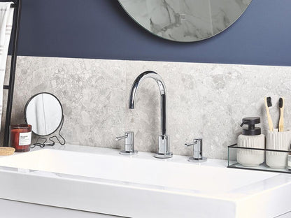 Silver bathroom sink faucet