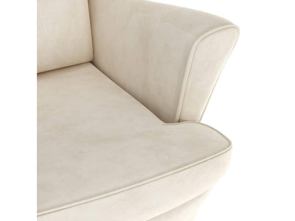 Wingback armchair with cream velvet footstool