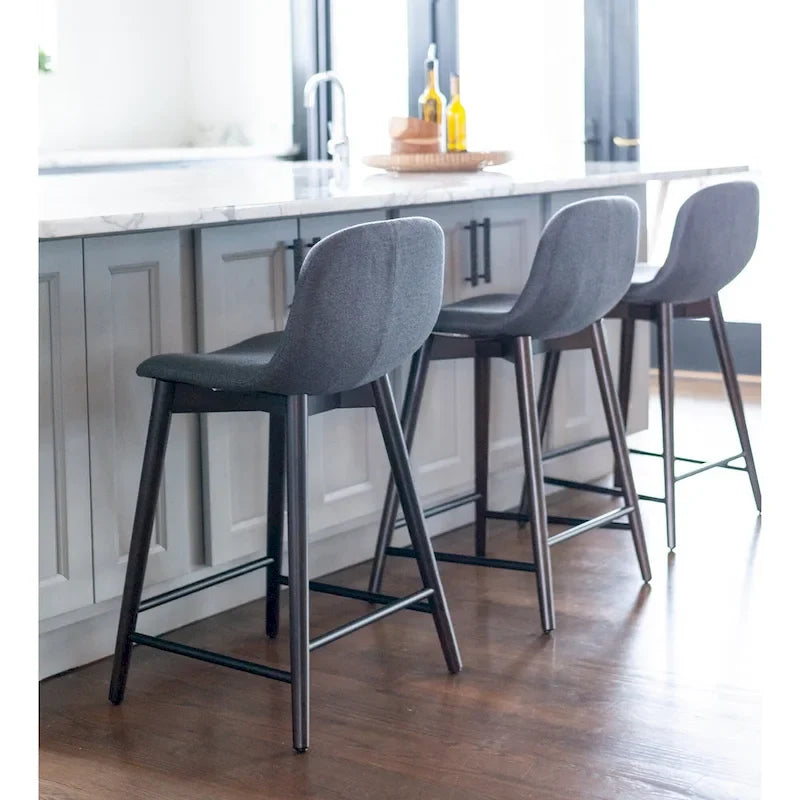 Upholstered Solid Wood Counter Stool With Footrest by East at Main