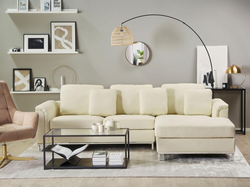 Right-hand corner sofa in beige genuine leather with quilted backrest and removable covers.