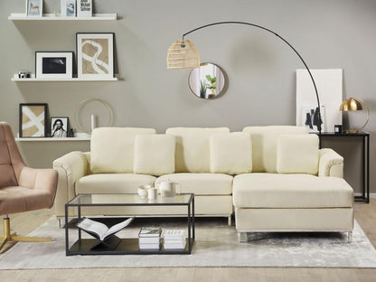Right-hand corner sofa in beige genuine leather with quilted backrest and removable covers.